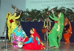 College girls presenting a folk dance during the Panjab University Zonal-level Youth and Heritage Festival 2011-12 at the Dasmesh Girls College