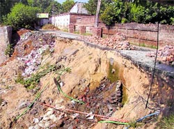 A file photo of the road that had caved in due to rain in Ludhiana
