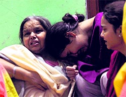 Relatives of Amrik Singh grieve over his death in Ludhiana on Sunday