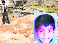 The spot from where the body of Golu (inset) was found near a tubewell at Budanpur village, opposite Sector 16, Panchkula, on Monday