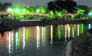 The lake at Sector 42 in Chandigarh is decked up for Chhat Puja