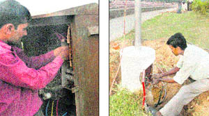 Workers carry out repairs on Monday. 