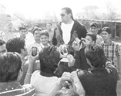 WWE wrestler Great Khali with fans in Zirakpur on Monday. 