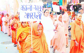 Sadhvis take out a procession against the proposed Prevention of Communal Violence Bill in Haridwar on Monday. 
