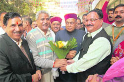 (From left) Khimi Ram, state BJP president, Ram Lal, national general secretary, Prem Kumar Dhumal, Chief Minister, and JP Nadda, national general secretary, before attending a meeting of the BJP in Shimla on Monday. 