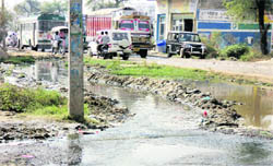 Sewage water at the busy National Highway 703 in Shahkot puts commuters to great inconvenience.