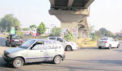 Haphazard movement of vehicles at a traffic diversion under the railway overbridge near Khalsa College in Jalandhar.