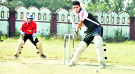A batsman in action in the Uttarakhand Youth 20-20 Cricket Tournament being played at Survey Stadium in Dehradun on Tuesday.