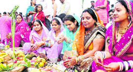 Women participate in Chhat Puja on the banks of the Ganga in Haridwar on Tuesday.