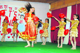 Children give a performance during the prize distribution function at Shimla Public School in Shimla.