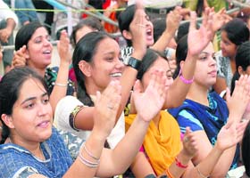 Students enjoy various cultural performances on the occasion of Punjab Divas at Lyallpur Khalsa College in Jalandhar on Monday