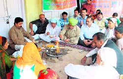 BJP leaders perform a havan on Tuesday at the party office in Jammu, on the eve of the commencement of the partys 10-day Jan Jagran Yatra across the state