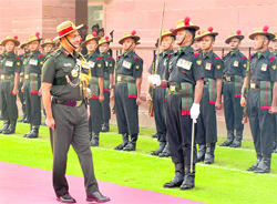 Newly appointed Army Vice-Chief Lt-Gen SK Singh inspects the Guard of Honour during the reception ceremony in New Delhi on Tuesday. 