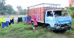 An abandoned truck parked in a green belt in Sector 24, Chandigarh