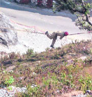An ITBP jawan displays talent during the first Inter-frontier Rock Climbing Competition in Mussoorie on Wednesday. 
