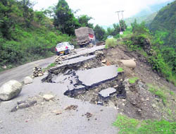 A damaged portion of the NH-21 near Pandoh in Mandi. 