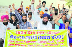 Victims of the 1984 riots sit on a fast unto death outside the Deputy Commissioners office in Jalandhar