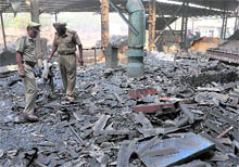 Policemen inspect the blast site at Paul Steels Pvt Ltd in Ludhiana on Wednesday