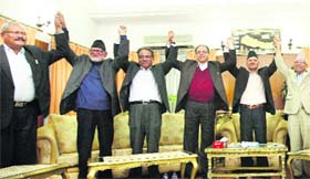 UNITED WE STAND: Nepals leaders after signing the peace deal in Kathmandu