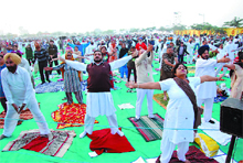 People perform yoga at the camp organised by Baba Ramdev in Bathinda on Thursdsay morning.