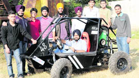 PEC students with their designed and manufactured all-terrain vehicle in Chandigarh.