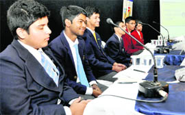 Students participate in a quiz at Summer Valley School in Dehradun on Thursday. 