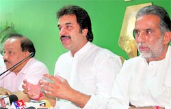 Kuldeep Bishnoi (centre) addresses a press conference in Chandigarh on Thursday. BJP president Krishanpal Gujjar (right) and Haryana BJP in charge Harshwardhan are also seen