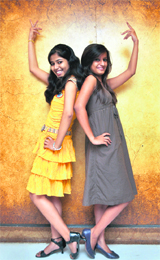 Chance for Dance contestants Radhika (left) and Megha pose for photographers in Ludhiana on Thursday.
