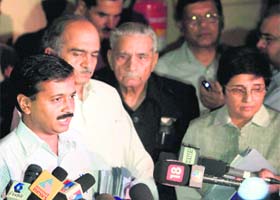 (L-R): Arvind Kejriwal, Prashant Bhushan, Shanti Bhushan and Kiran Bedi speak to mediapersons in New Delhi on Thursday