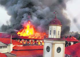 Flames engulf an administrative building in Mumbai's Naval Dockyard on Thursday