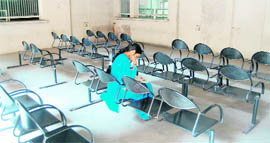 A lone applicant sits at the tehsil complex in Amritsar.