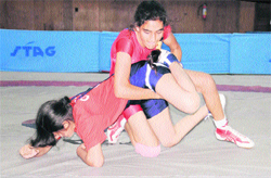 Girls in action during a wrestling bout in Chandigarh on Friday. 