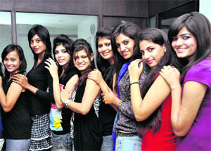 Participants of a Miss Beautiful Hair contest held in Dehradun on Friday. 