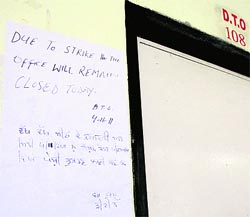 A notice put up outside the office of the DTO confused the visitors as it cited two separate reasons for the absence of the staff. While the message in English mentioned that the staff was on strike, the other in Punjabi conveyed that the staff from various counters had gone to Patiala to attend a case in the Sessions Court