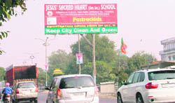 A unipole carrying an advertisement of a school in Ludhiana.