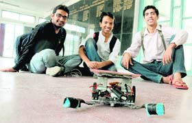 PEC students with the robot designed by them in Chandigarh