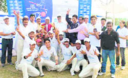 The Minda Corporation cricket team with the CII Uttarakhand-Tata Motors Cricket Cup in Dehradun