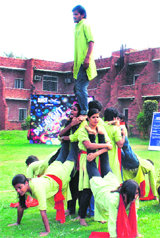 Artistes perform a nukkad natak on HIV/AIDS at Management Development Institute in Gurgaon on Saturday.