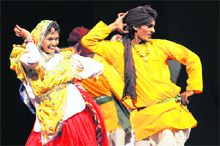 Participants perform a Haryanvi group dance on the concluding day of Ratnawali, the 26th Haryana Day function at Kurukshetra University in Kurukshetra on Saturday.