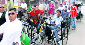 Members of the Physically Handicapped Association of Punjab and Chandigarh take part in a protest march in Nawanshahr on Saturday.