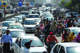 A road choked with traffic causing inconvenience to the commuters in Bathinda.