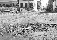 A potholed road at Ward No. 2 in Zirakpur.