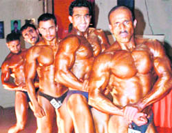 Winners strike a pose after the bodybuilding championship at DAV College, Sector 10, in Chandigarh on Sunday. 