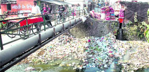 Heaps of garbage in a drain at  Ward No. 35, in Dehradun. 