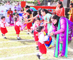 Tiny tots of Little Flower School participate in a race in Dehradun on Sunday. 