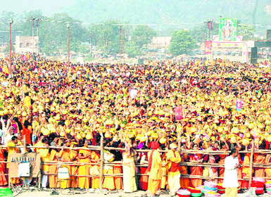 Gayatri Parivar actiivists take part in a kalash yatra in Haridwar on Sunday. 