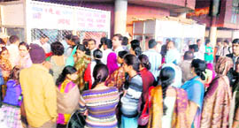 Additional buses were pressed into service to cope with the rush of examinees. Picture shows ticket counters at Rohtak on Sunday.