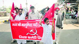 CPM activists hold demonstration against corruption and rising prices at Sirsa on Sunday.