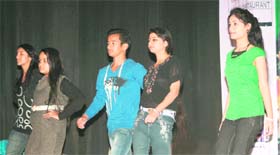 Youth performing on stage during a talent hunt organised by Bhartiya Lok Sangeet Kala Sansthan and Super Model Club in Jammu on Sunday