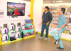 Youths play a motion game in Ludhiana.